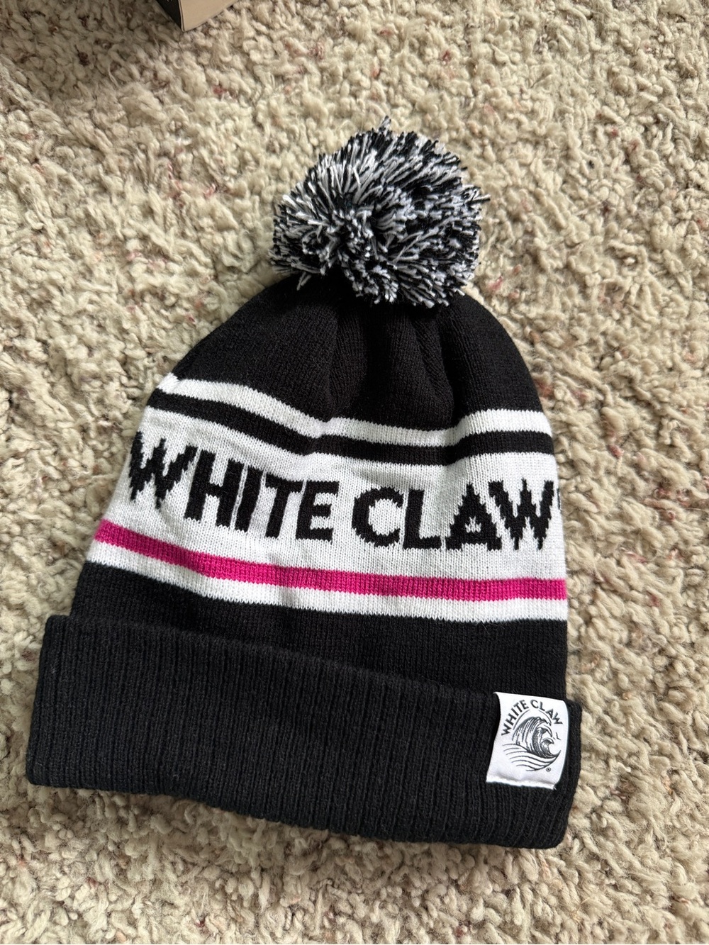 White Claw Pom Beanie - Black with White & Pink Stripes